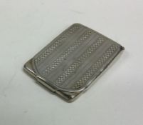 A novelty silver engine turned match case with hin