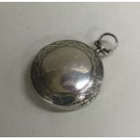 An unusual circular silver gilt vinaigrette with h