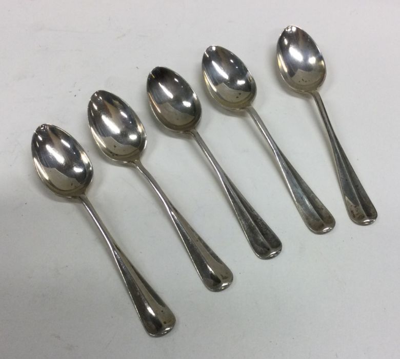 A set of five OE pattern silver coffee spoons. She