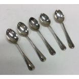 A set of five OE pattern silver coffee spoons. She