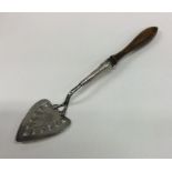 A rare silver pastry trowel with pierced decoratio