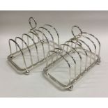 A good pair of silver seven bar toast racks with b