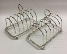 A good pair of silver seven bar toast racks with b