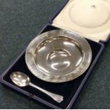 A good large silver armada dish together with matc