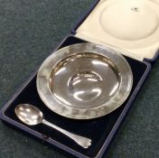 A good large silver armada dish together with matc