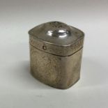 A Dutch silver hinged top pill box decorated with