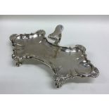 A large Georgian silver snuffer tray with shell de