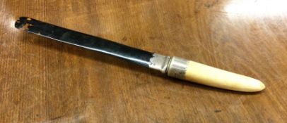 A tortoiseshell and silver mounted letter opener /