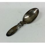 GEORG JENSEN: A stylish silver caddy spoon of typi