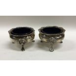A pair of Edwardian silver salts with gadroon rims