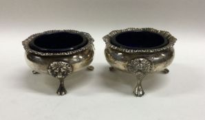 A pair of Edwardian silver salts with gadroon rims