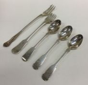 EXETER: A group of three silver egg spoons togethe