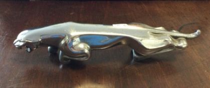 A reproduction Jaguar car mascot. Est. £30 - £50.