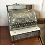 An old American style cash register. Est. £100 - £