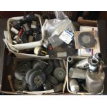 A box containing model aircraft wheels etc. Est. £