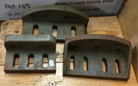 A quantity of three engineering mounts. Est. £10 - £15.