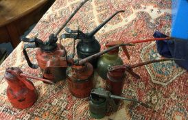 A selection of 7 Lever-Type Oil Cans. Est. £5 - £10.