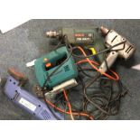 A Collection of Power Tools to include two electric drills, a planer and a Black & Decker jigsaw