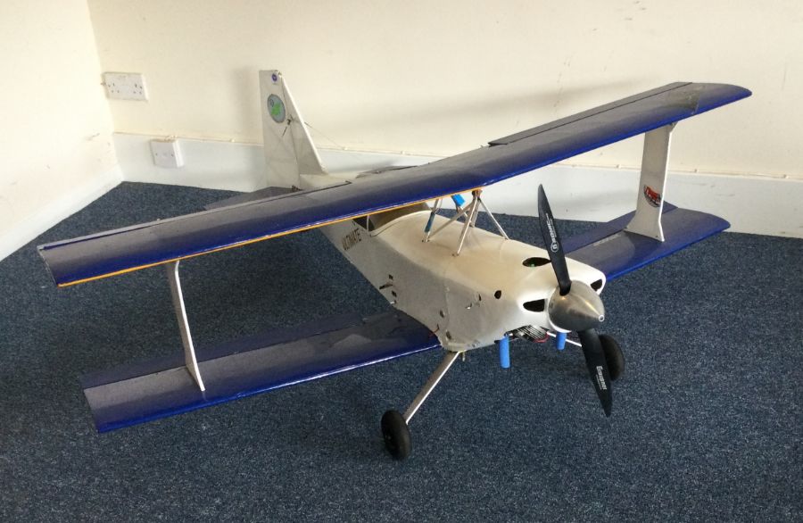 A scratch built Aerobatic model aircraft with blue