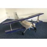 A scratch built Aerobatic model aircraft with blue