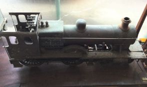 A five inch gauge live steam locomotive with tender. Est. £1000 - £1500.