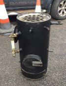 A steel vertical boiler. Est. £80 - £100.