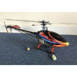 A petrol driven remote control model helicopter. E