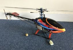 A petrol driven remote control model helicopter. E