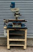 A Chester Milling Machine mounted on industrial workshop table. Est. £400 - £500.
