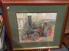 A hand-stitched traction engine in picture frame. Est. £5 - £10.