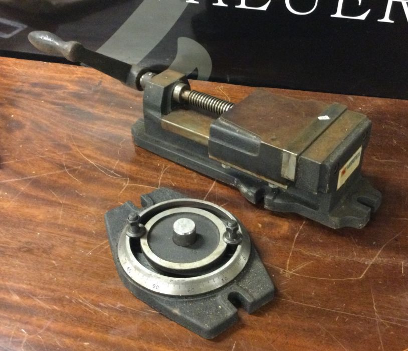 A Vertex Precision Milling Machine Vice with swivel base. Est. £100 - £150.