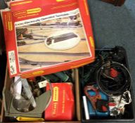 An assortment of 00 gauge railway track together with an electric turntable unit. Est. £10 - £20.