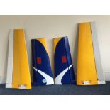 Two pairs of aircraft wings. Est. £10 - £20.