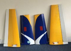 Two pairs of aircraft wings. Est. £10 - £20.