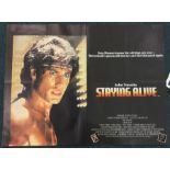 A John Travolta ' Staying Alive' film poster. Appr