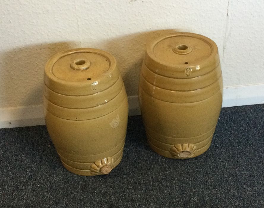 Two barrel shaped urns. Est. £10 - £20.