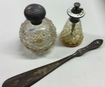 A hobnail cut silver mounted scent bottle together