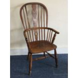 An old elm stick back Windsor chair. Est. £80 - £1