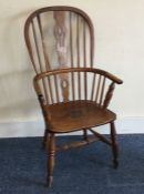 An old elm stick back Windsor chair. Est. £80 - £1