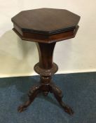 An Edwardian shaped sewing box with fitted interio