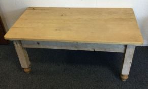 A good stripped pine occasional table. Est. £20 -