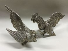 DUBLIN: A pair of heavy cast silver cockerels with