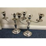 A pair of Adams' style silver plated candelabra.