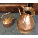 A large copper ewer together with a copper kettle.