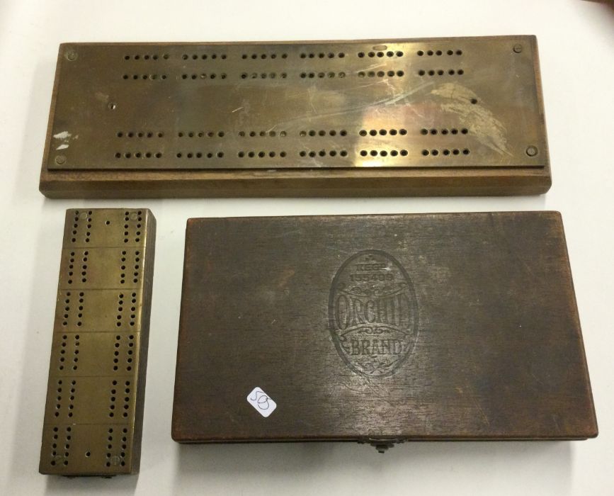 Two brass mounted cribbage boards together with dr