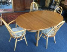 ERCOL: A good dining table together with leaf of s