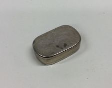 An oval Georgian silver snuff box with bright cut