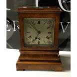 A good quality burr walnut striking mantle clock w