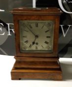 A good quality burr walnut striking mantle clock w