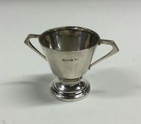 An Edwardian silver small tapering trophy cup. She